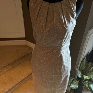 Beautiful gold sleeveless dress size 4. This dress is special in every way!